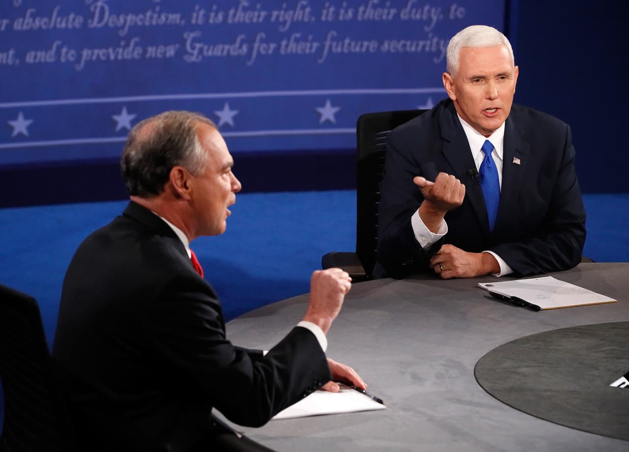 FARMVILLE, VA - OCTOBER 04: Democratic vice presidential nominee Tim Kaine (L) and Republican vice presidential nominee Mike Pence (R) speak during the Vice Presidential Debate at Longwood University on October 4, 2016 in Farmville, Virginia. This is the second of four debates during the presidential election season and the only debate between the vice presidential candidates. (Photo by Andrew Gombert - Pool/Getty Images)