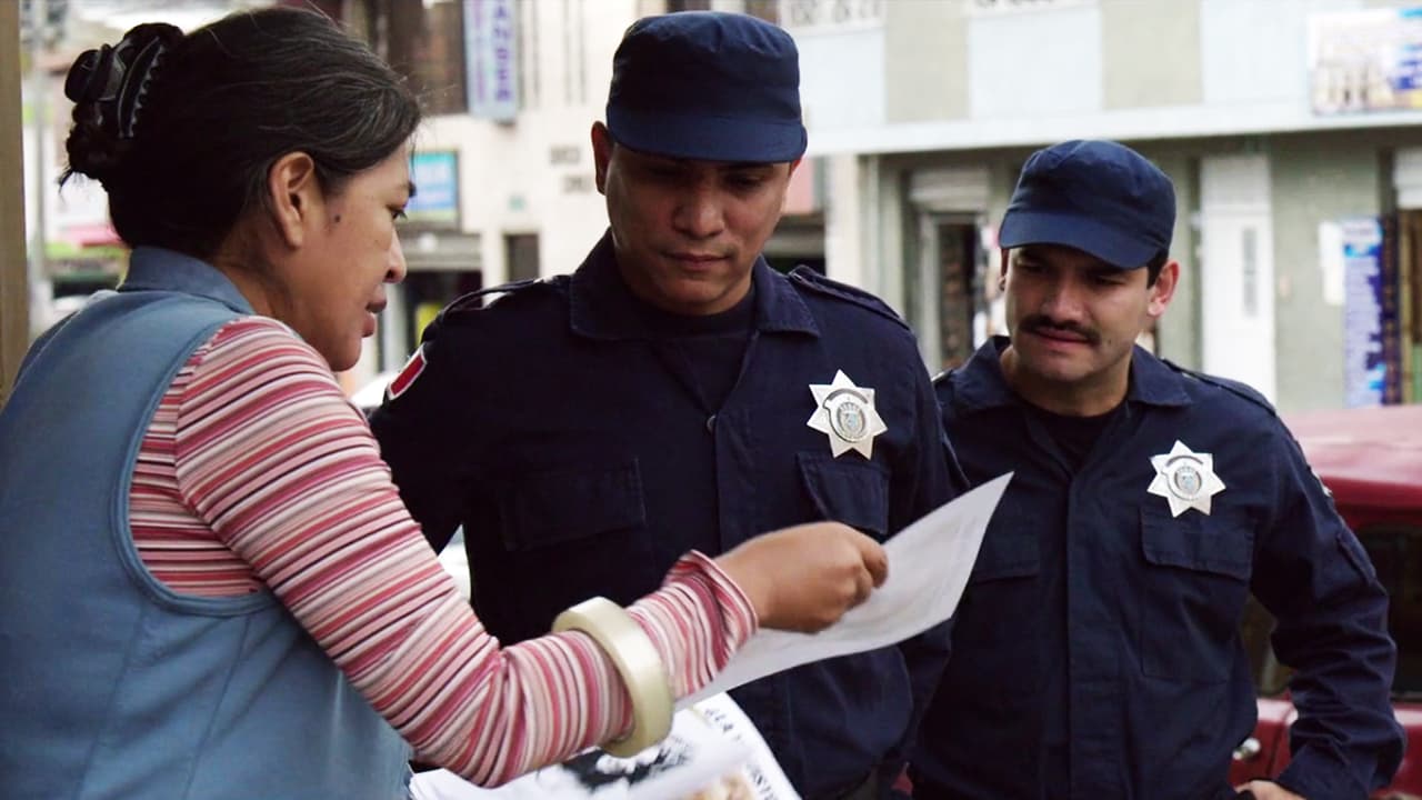 Surprisingly, two police officers approached to inform her that her daughter was being held by one of the drug lords of the area. She would need to negotiate with him.