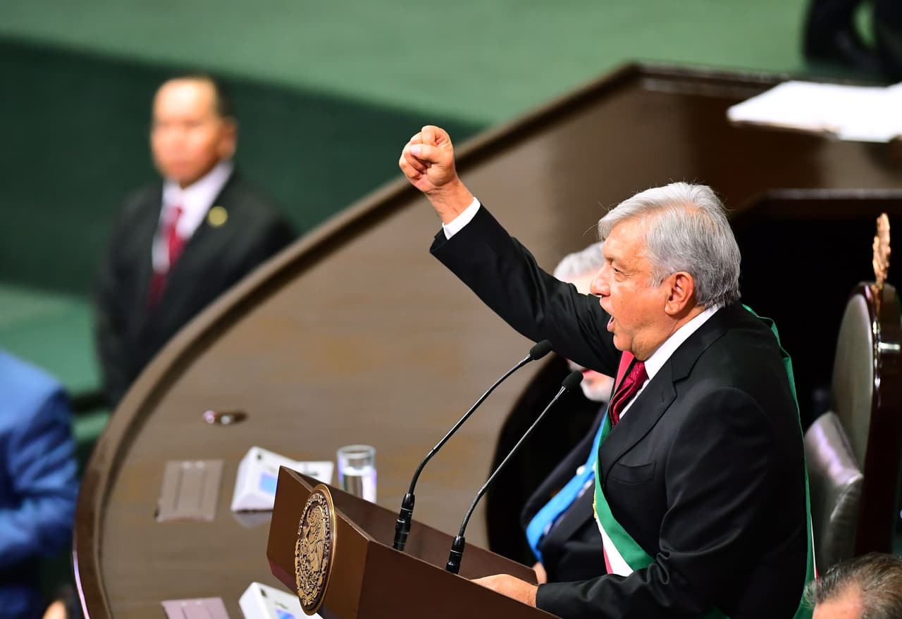 Mexico's new President Andres Manuel Lopez Obrador delivers a speech during the inauguration ceremony at the Congress of the Union, in Mexico City on December 1, 2018. - Lopez Obrador, 65, won Mexico's July 1 election in a landslide, and euphoric supporters are full of hope that the fiery populist will bring sweeping change, slash poverty and fight endemic corruption. (Photo by RONALDO SCHEMIDT / AFP) (Photo credit should read RONALDO SCHEMIDT/AFP/Getty Images)