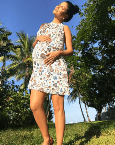 Aunque su pancita está cada día más pesada, Ana está feliz con ella.