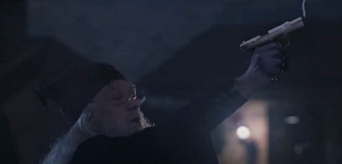 Dumbledore disparando un arma de fuego