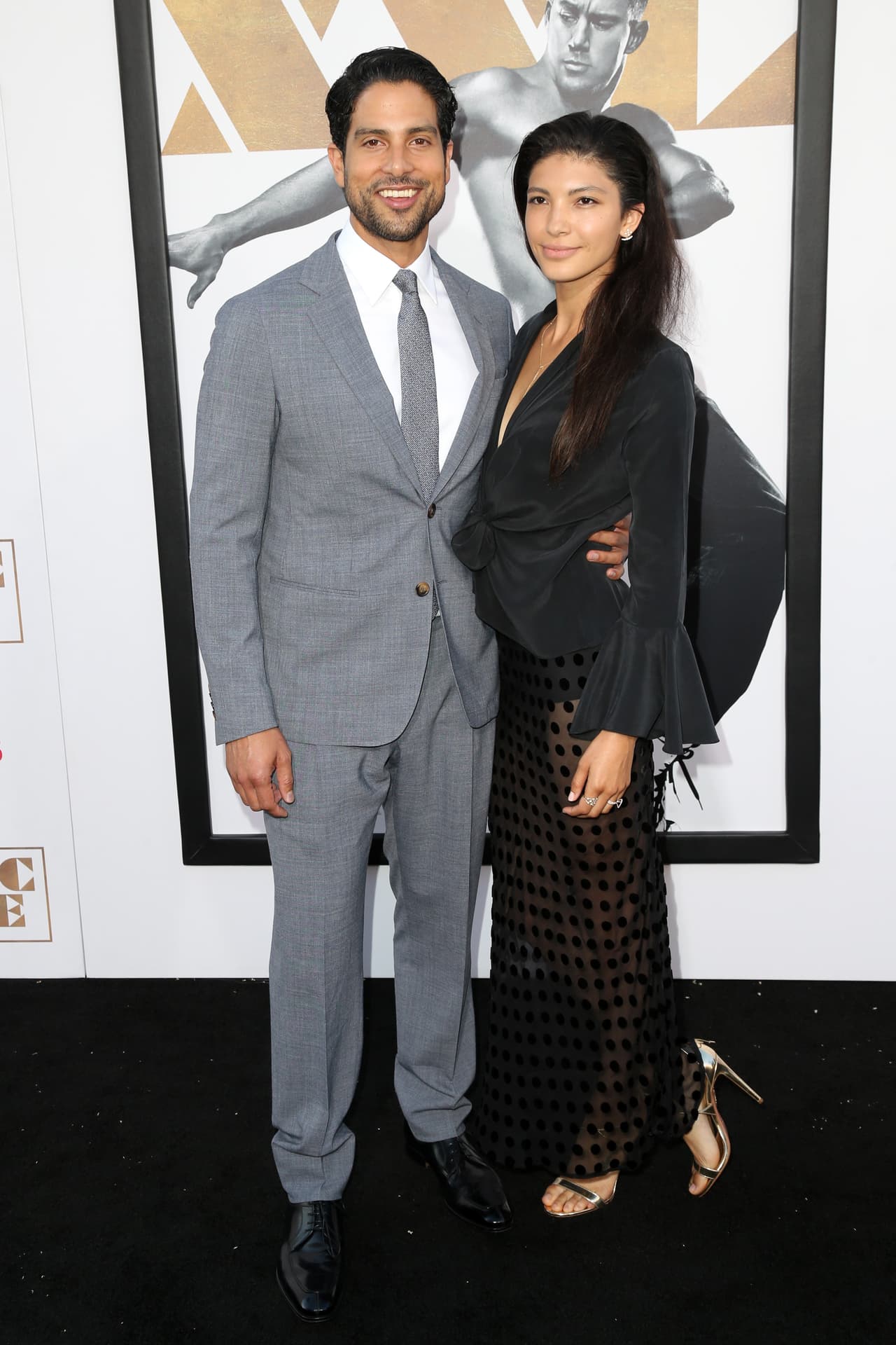 Adam Rodriguez con su pareja