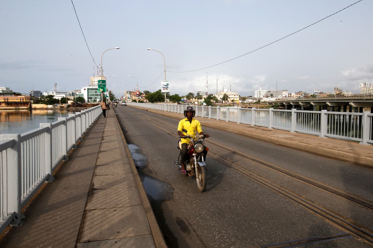 Motorcycle on a bridge in Cotonou, Benin.