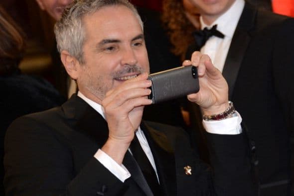 El director mexicano Alfonso Cuarón ganó la estatuilla por la mejor dirección, del filme ¨Gravity¨".