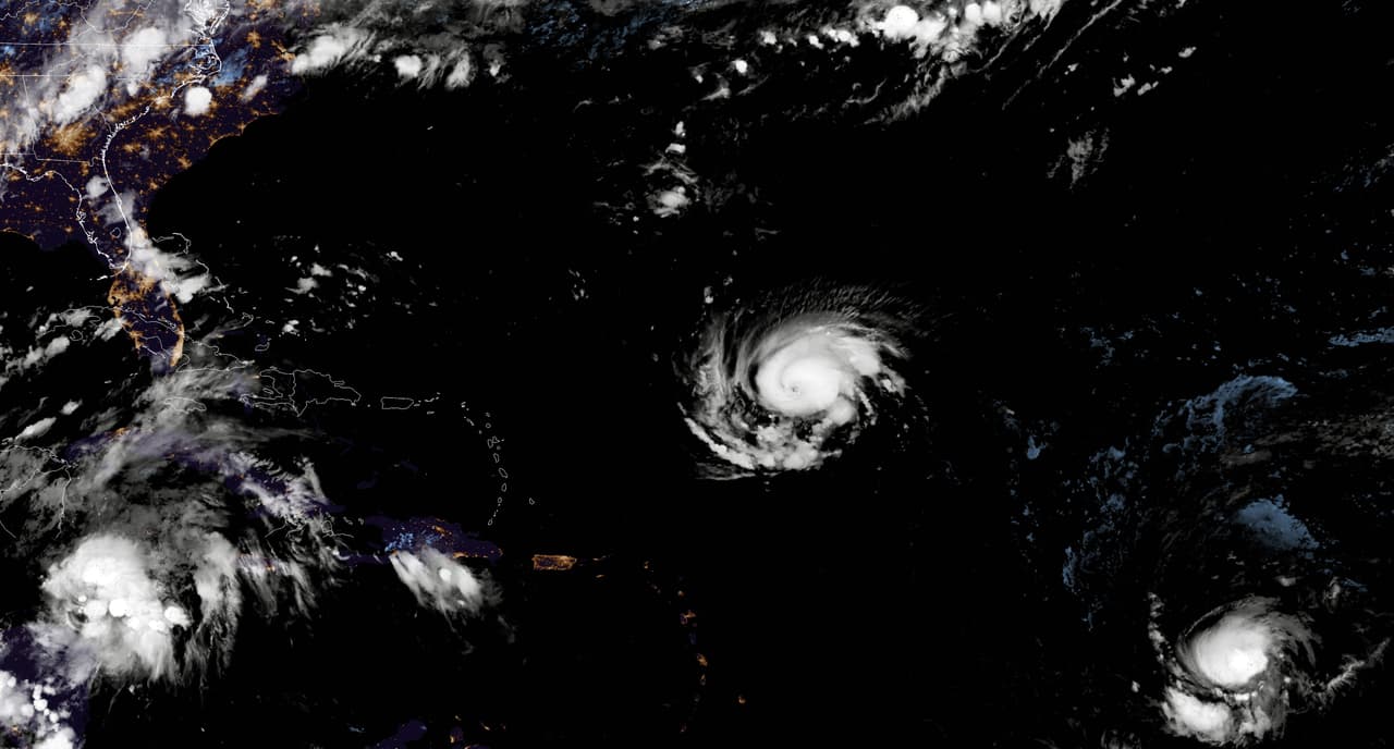 ATLANTIC OCEAN - SEPTEMBER 10 In this NOAA satellite handout image, shows Hurricane Florence as it gains strength in the Atlantic Ocean southeast of Bermuda on September 10, 2018. Weather predictions say the storm will likely hit the U.S. East Coast as early as Thursday, September 13 bringing massive winds and rain. (Photo by NOAA via Getty Images)