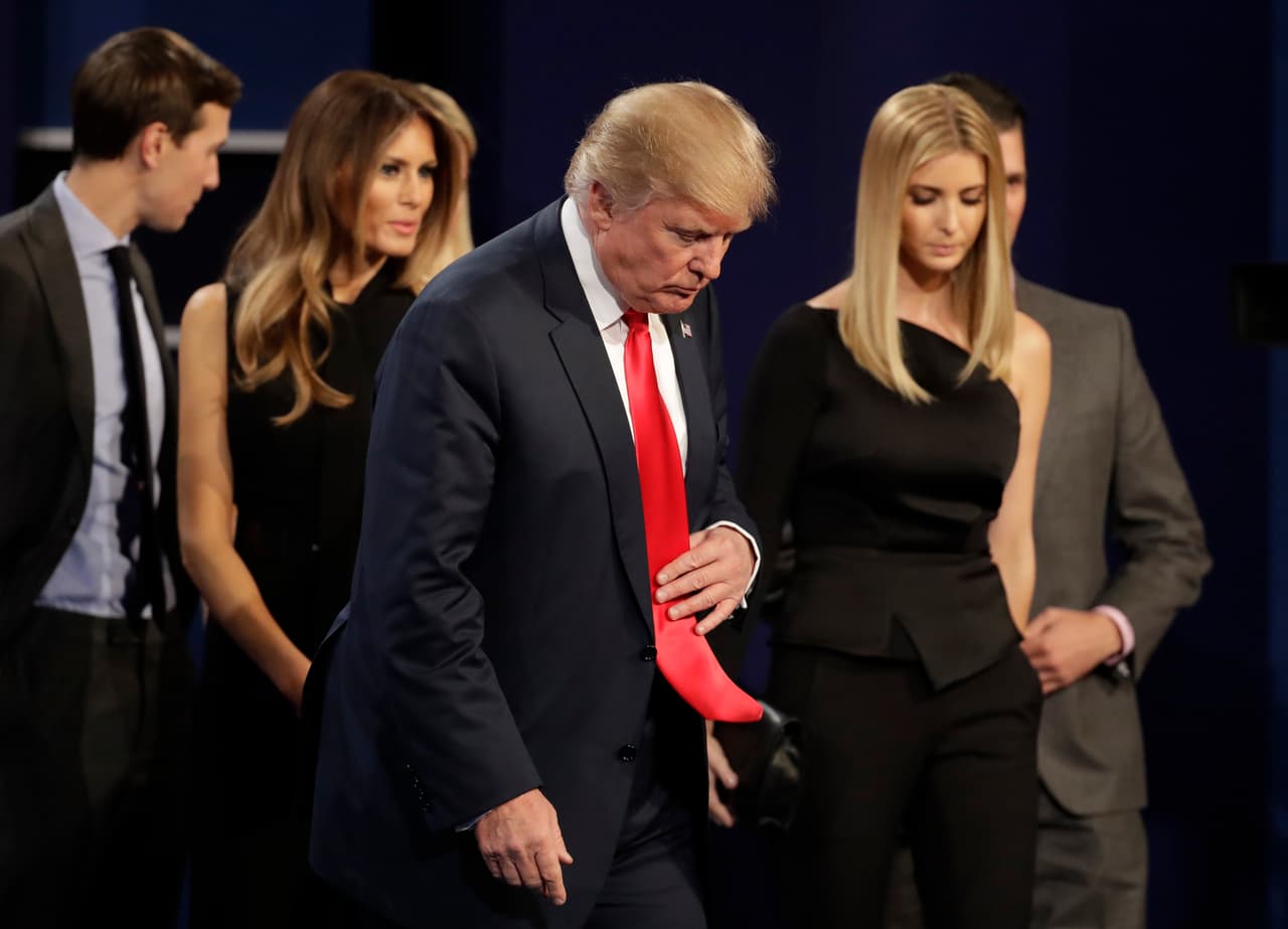 Republican presidential nominee Donald Trump leaves the stage with his family following the third presidential debate with Democratic presidential nominee Hillary Clinton at UNLV in Las Vegas, Wednesday, Oct. 19, 2016. (AP Photo/Patrick Semansky)
