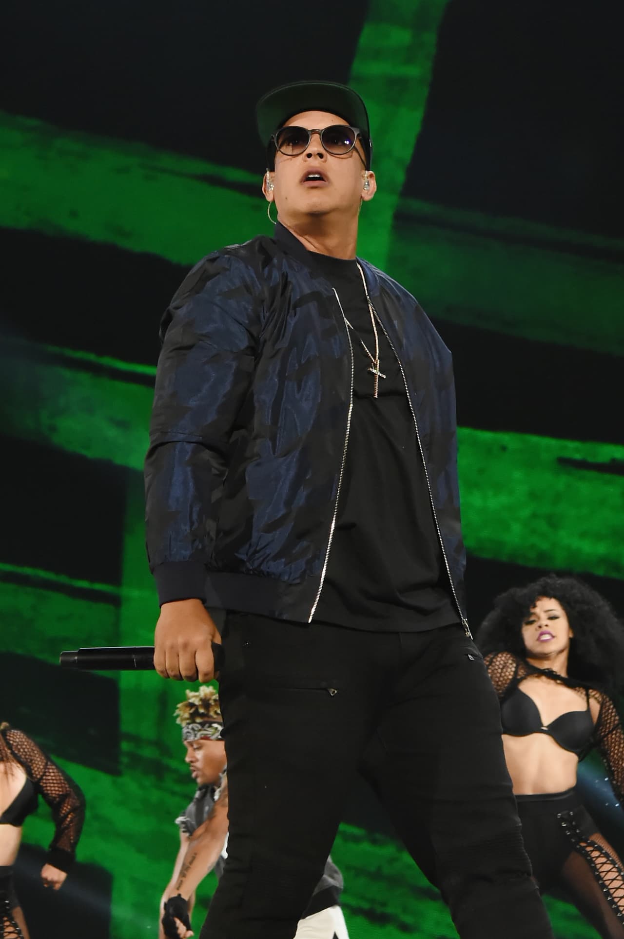 MIAMI, FL - OCTOBER 14: In this handout photo provided by One Voice: Somos Live!, Daddy Yankee performs onstage at One Voice: Somos Live! A Concert For Disaster Relief at Marlins Park on October 14, 2017 in Miami, Florida. (Photo by Rick Diamond/One Voice: Somos Live!/Getty Images)