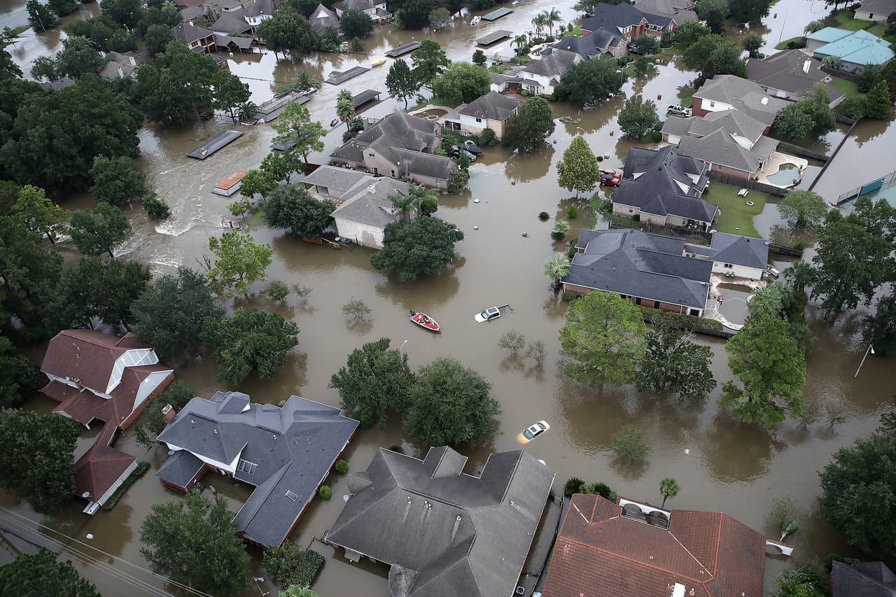 HOUSTON, TX - AUGUST 30: Flooded homes are shown near Lake Houston following Hurricane Harvey August 30, 2017 in Houston, Texas. The city of Houston is still experiencing severe flooding in some areas due to the accumulation of historic levels of rainfall, though the storm has moved to the north and east. (Photo by Win McNamee/Getty Images)