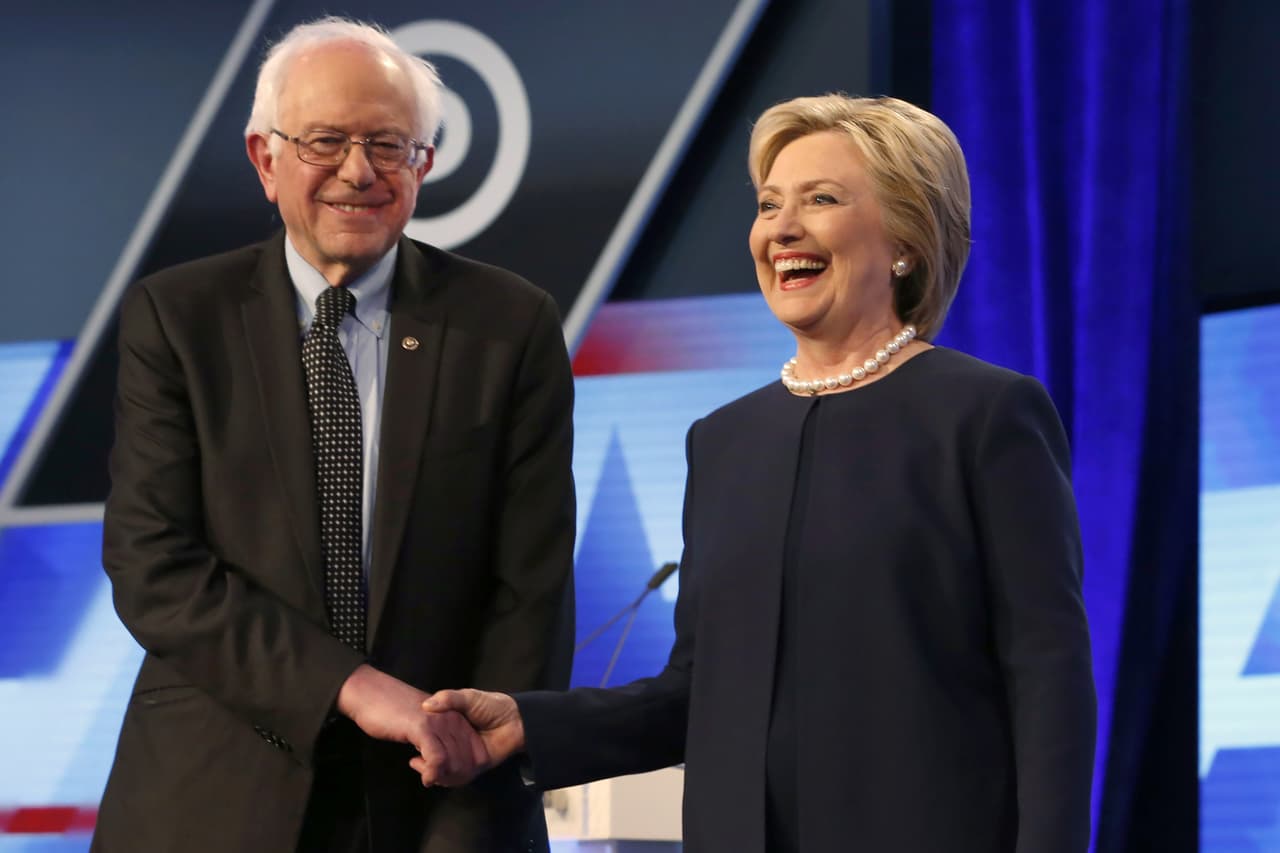 Clinton y Sanders tratan de conciliar sus propuestas 