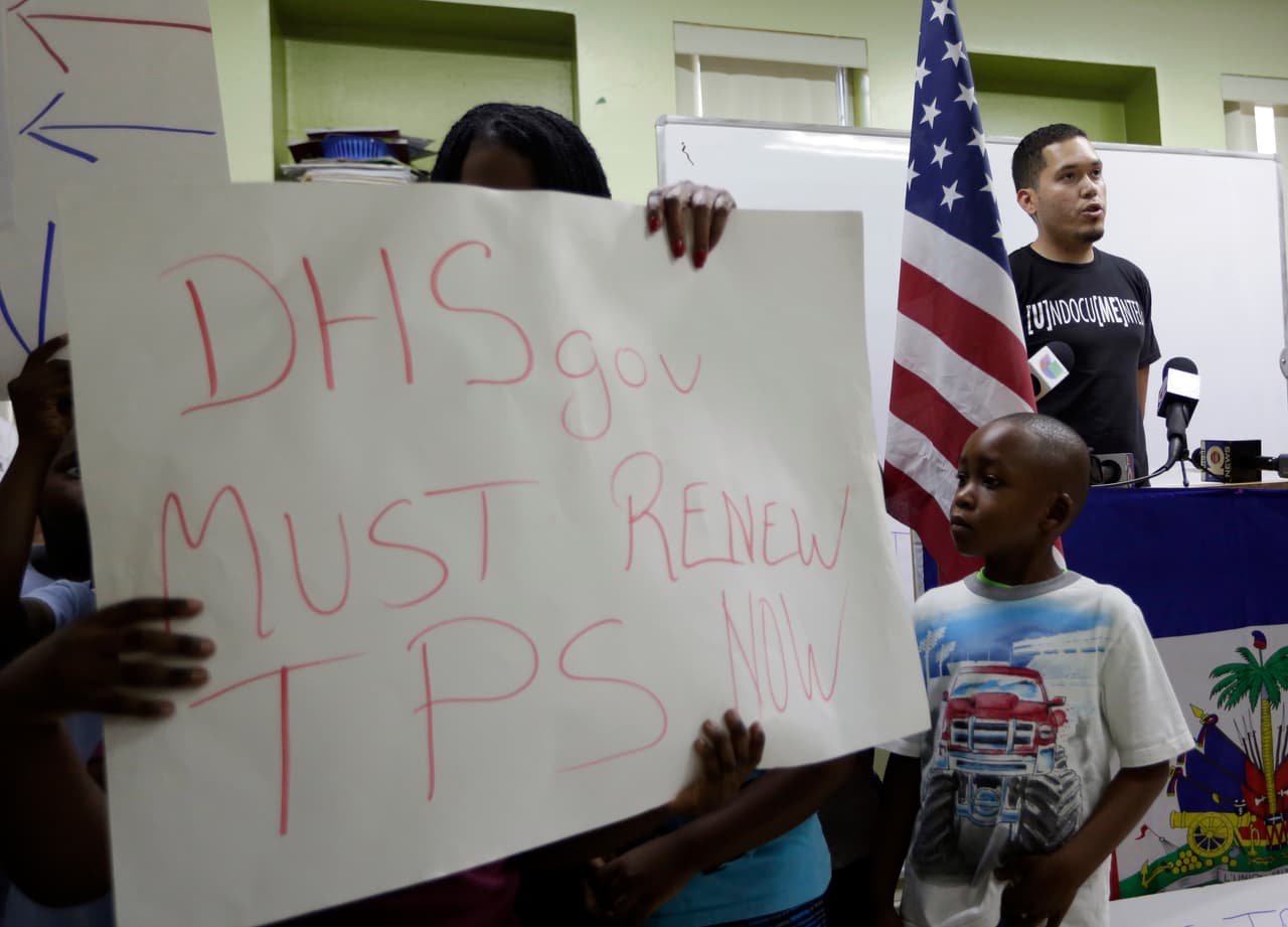 Julio Calderon, 28, upper right, an undocumented immigrant from Honduras, speaks in favor of renewing Temporary Protected Status (TPS) for immigrants from Central America and Haiti now living in the United States, during a news conference Monday, Nov. 6, 2017, in Miami. The Department of Homeland Security is expected to rule soon on whether or not to renew the protected status. (AP Photo/Lynne Sladky)