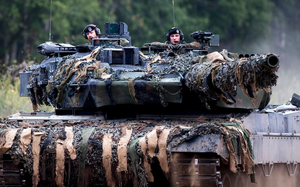 In January, Germany agreed to supply 14 of its advanced Leopard 2 tanks to Ukraine. In this phto, soldiers of the NATO enhanced forward presence battalion with Germany Leopard 2 tank take part in the NATO military exercise in Lithuania.