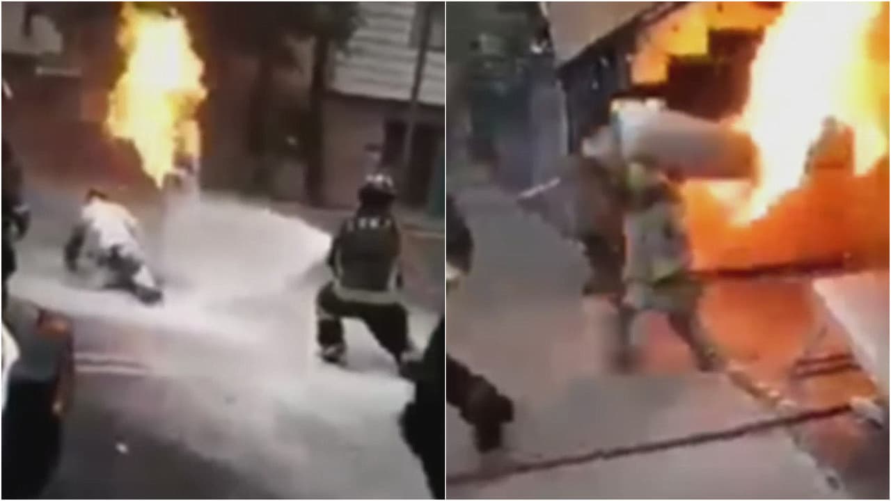<b>Bombero carga un tanque envuelto en llamas para impedir una tragedia</b>
<br>
<br>En video quedó grabado cómo el bombero Alexis Ramírez Sánchez cargó un tanque a punto de estallar. El hombre lo sacó de un restaurante hasta la mitad de la calle y de inmediato sus compañeros comenzaron a rociar el recipiente con agua especial para evitar que explotara.