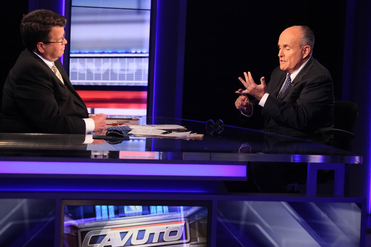 Rudy Giuliani con Neil Cavuto en una entrevista años atrás.