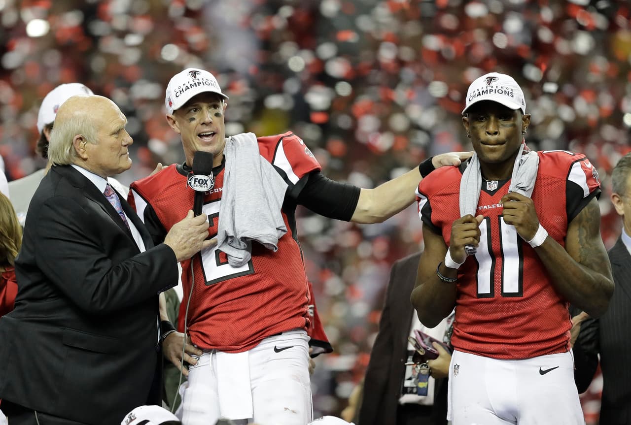 Former NFL player and sports broadcaster Terry Bradshaw interviews Atlanta Falcons' Matt Ryan (2) and Julio Jones after the NFL football NFC championship game against the Green Bay Packers, Sunday, Jan. 22, 2017, in Atlanta. The Falcons won 44-21 to advance to Super Bowl LI. (AP Photo/David Goldman)