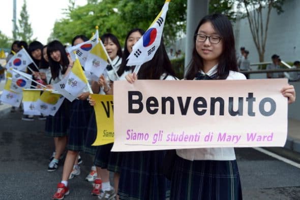 Carteles le daban la bienvenida en italiano.