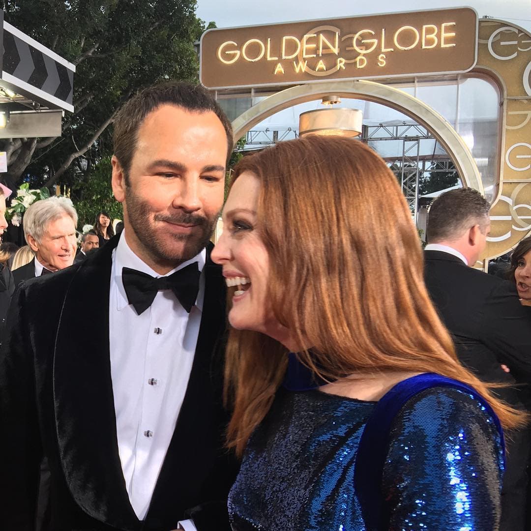Julianne Moore muerta de risa junto a Tom Ford.