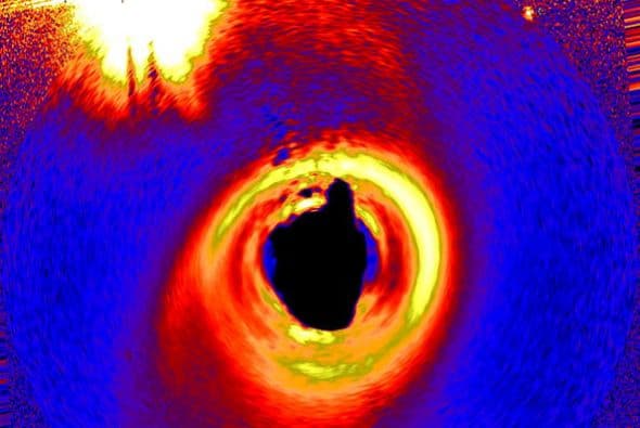 Una interpretación generada por un ordenador captada por el Hubble de una nube de polvo alrededor de una estrella joven a 320 años-luz de la Tierra.