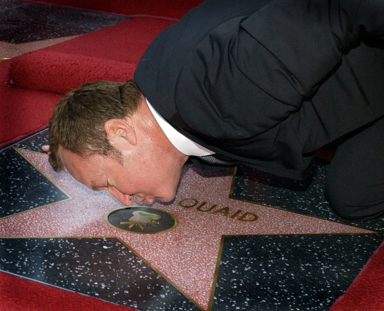 Quaid mantuvo una exitosa carrera en Hollywood durante más de tres décadas. Fue incluso nominado a un Óscar en 1974, además de varios premios internacionales. En la imagen aparece el día que recibió su estrella en el Paseo de la Fama, en 2003.