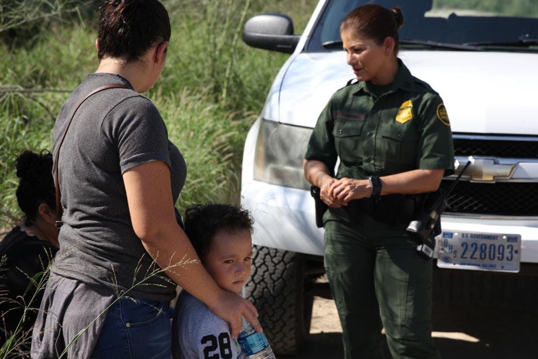 This Salvadoran mother and her son crossed the Rio Grande just 10 minutes earlier, presumably helped by coyotes. Many families voluntarily surrender to agents when they see the Border Patrol. After a few days of detention, they are free to meet with relatives in other parts of the United States while they wait to go to court.