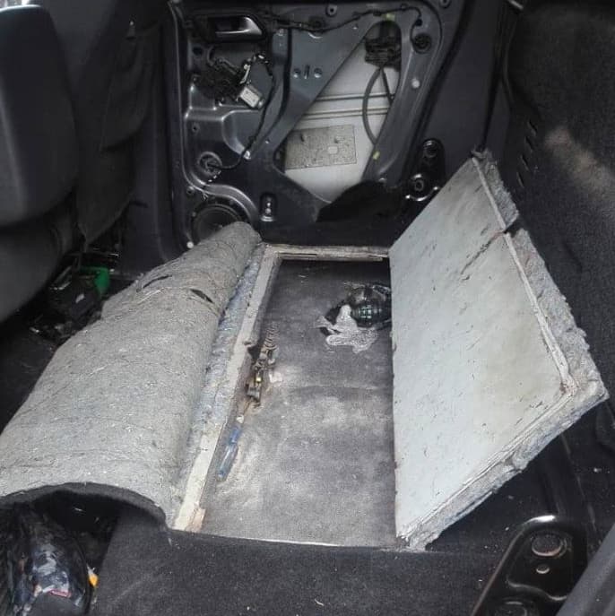 This hidden compartment was found under the seats of one of Nery López's cars when he was arrested on June 6, 2018.