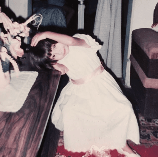 Ella era una niña bella y soñadora. En muchas de las fotos sale bailando.