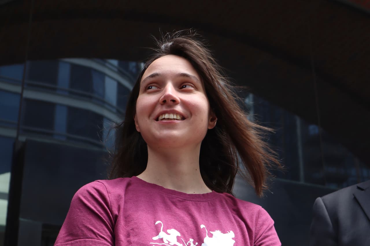 Kseniia Petrova, 30, smiles after being released on bail from federal custody at the John Joseph Moakley United States Courthouse on Thursday, June 12, 2025, in Boston. (AP Photo/Leah Willingham)