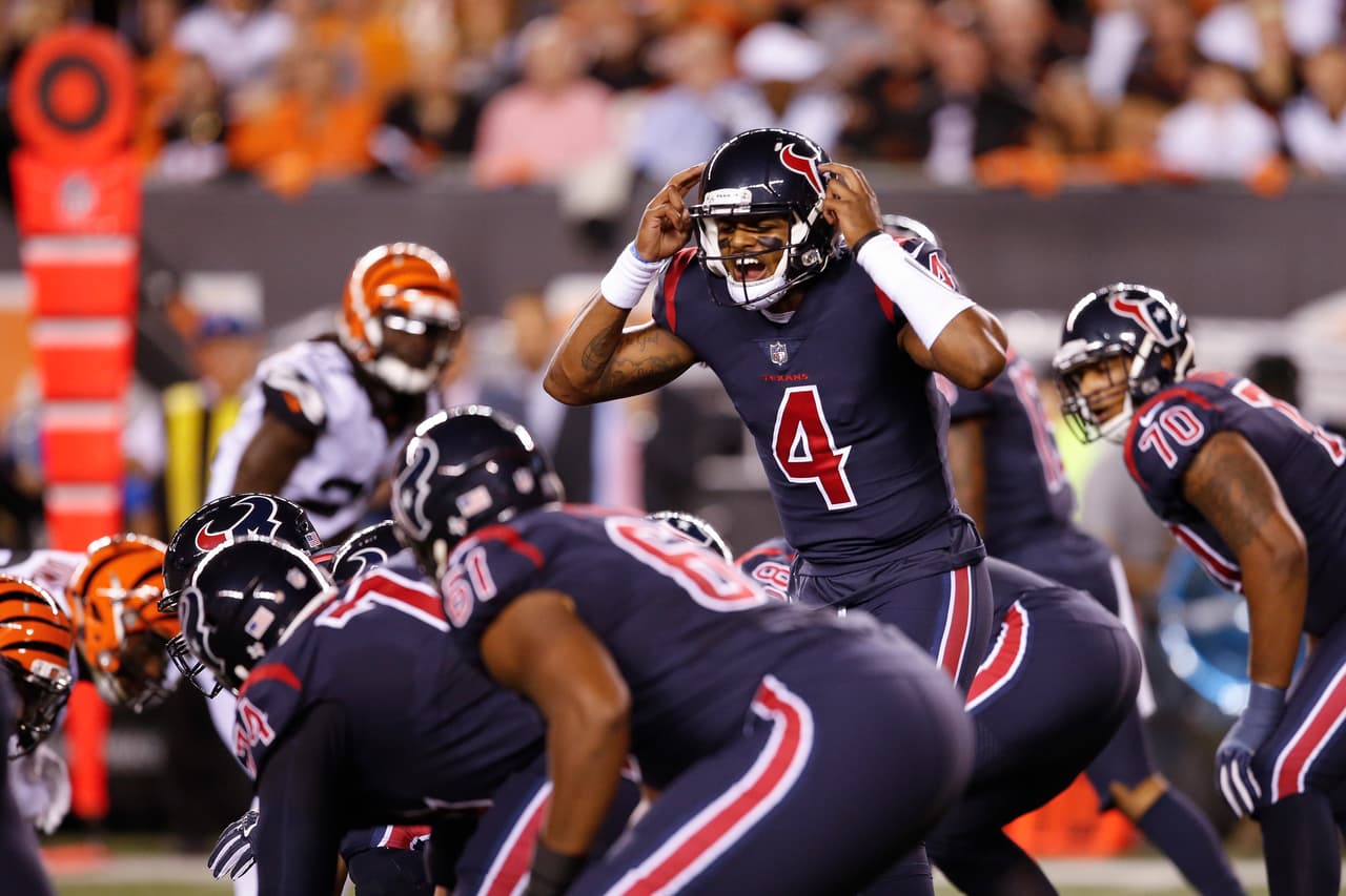 Houston Texans quarterback Deshaun Watson (4) directs his players in the first half of an NFL football game against the Cincinnati Bengals, Thursday, Sept. 14, 2017, in Cincinnati. (AP Photo/Gary Landers)