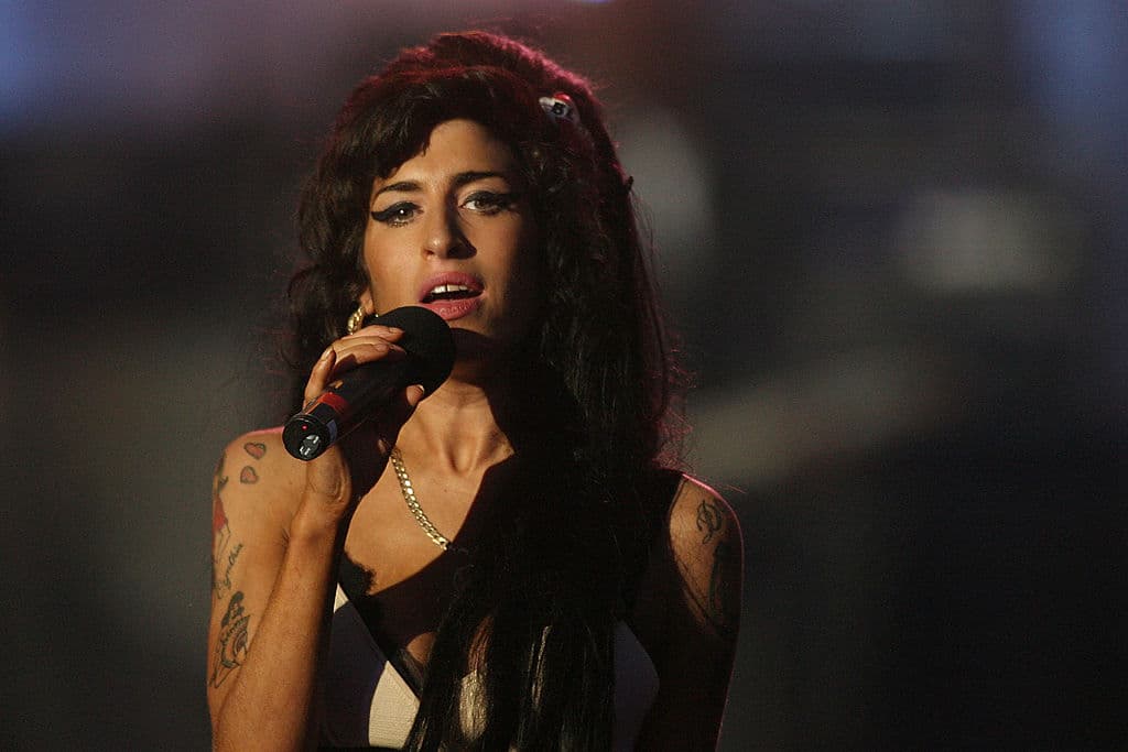 LONDON - JUNE 27: Amy Winehouse performs during the 46664 concert in celebration of Nelson Mandela's life at Hyde Park on June 27, 2008 in London, England. (Photo by Dan Kitwood/Getty Images)