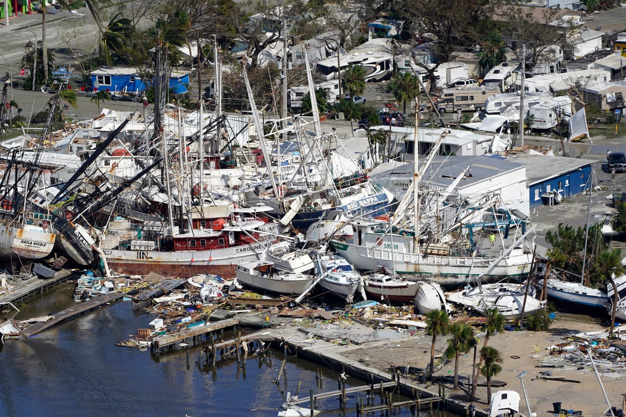 In many places, debris was piled up around the docks. Authorities have said Ian could be the most damaging hurricane ever to hit Florida.