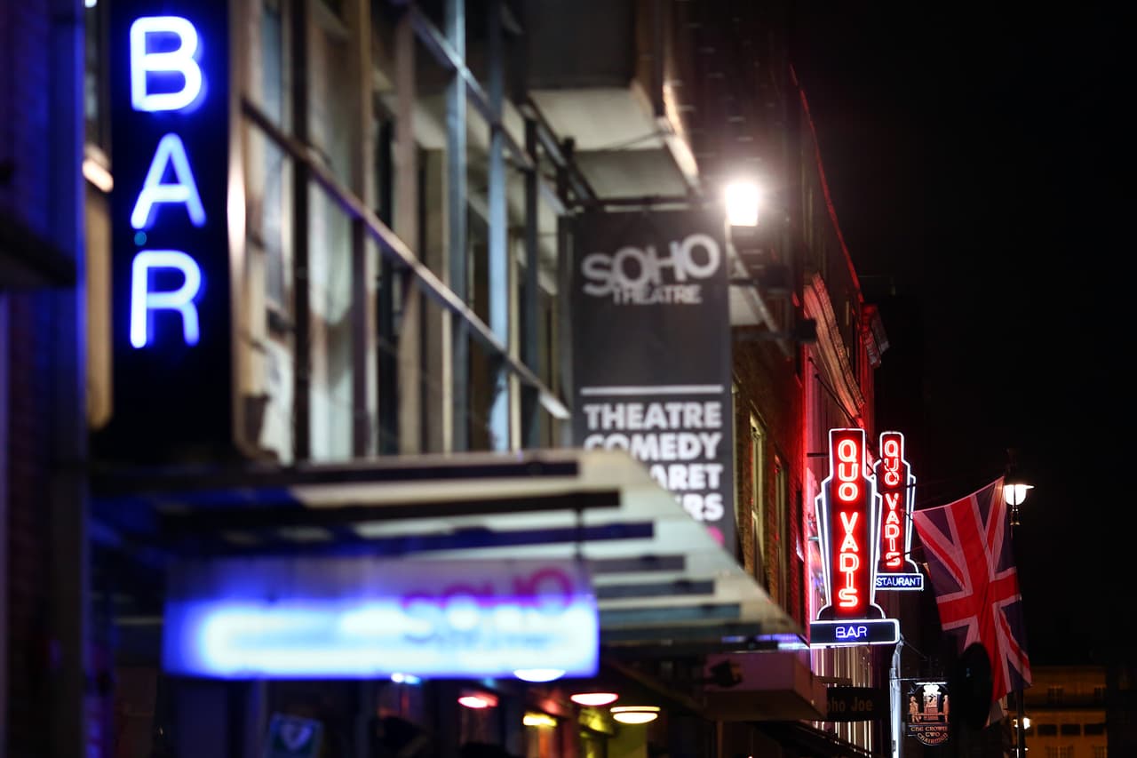 LONDON, ENGLAND - JANUARY 19: Neon signs are seen in Soho on January 19, 2015 in London, England. A growing number of campaigners, including Stephen Fry, are pushing developers and representatives of Westminster Council to preserve the area's unique identity, which they fear is being lost as the area is gradually redeveloped. (Photo by Carl Court/Getty Images)