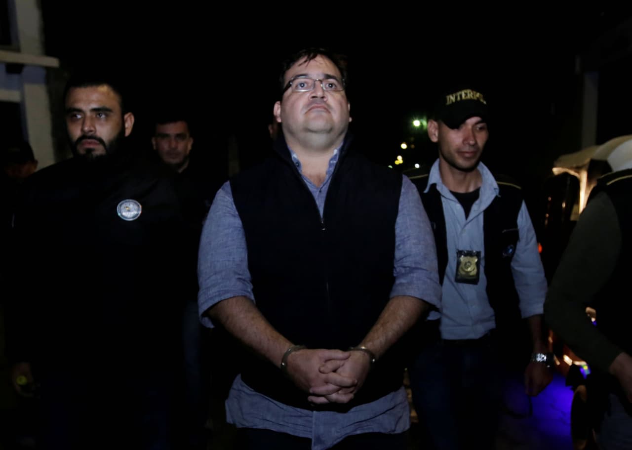 Former Veracruz governor Javier Duarte is escorted by police after hios arrest in Guatemala. He is wanted in Mexico for alleged public embezzlement and money laundering.
