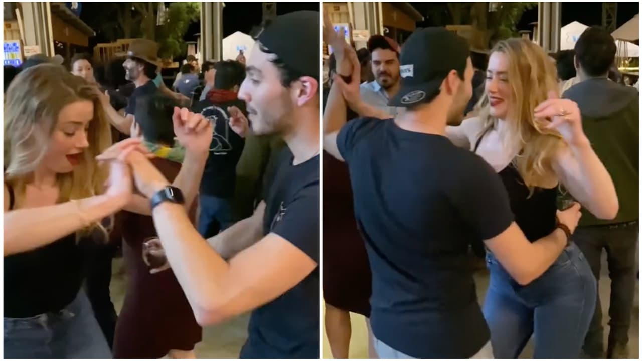 Cachan a Amber Heard bailando 'Como la flor' de Selena Quintanilla con un hombre