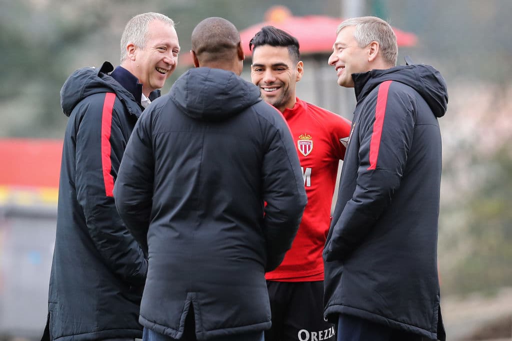 Monaco's Colombian forward Radamel Falcao (2ndR) speaks to Monaco's Russian Vice club President Vadim Vasilyev (L), and Monaco's Russian president Dmitriy Rybolovlev (R) during a training session on March 29, 2018 at training camp in La Turbie near Monaco.