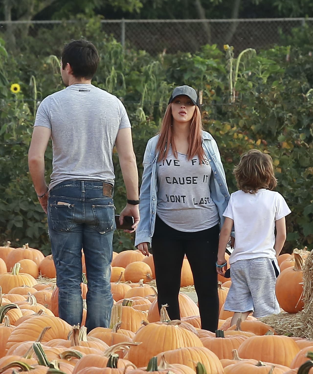 Se pusieron a ver entre tantas calabazas cuál llevarse y fue cuando Christina notó que estaban siendo retratados.