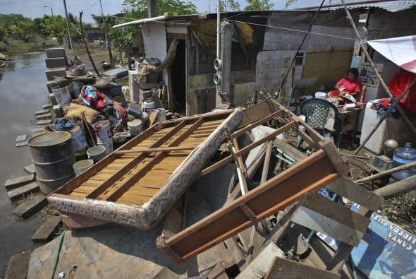 Las lluvias inundaron pueblos, cultivos, destruyeron parcialmente carreteras y paralizaron el comercio y el turismo en amplias regiones del estado.