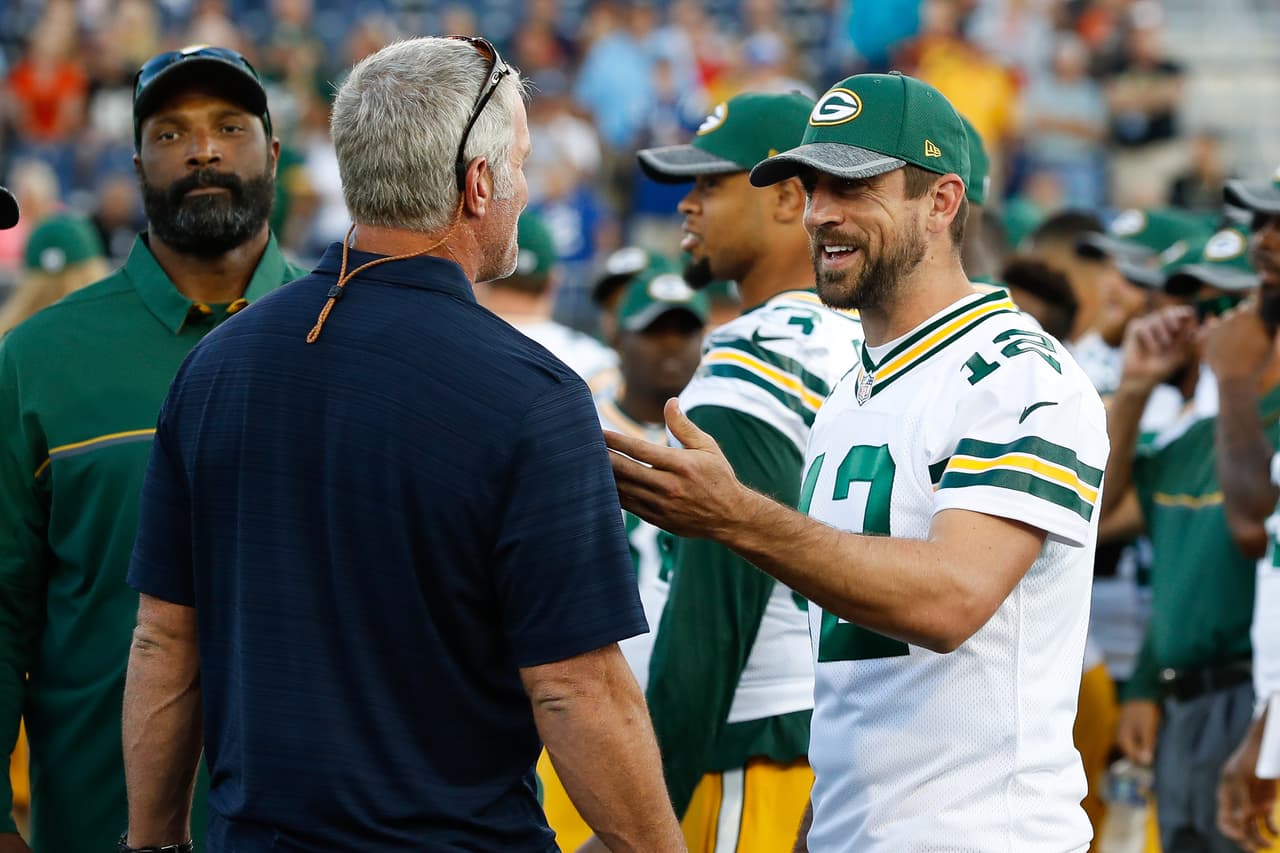 Former NFL player Brett Favre (left) talks with Green Bay Packers quarterback Aaron Rodgers (12) prior to an NFL preseason football game against the Indianapolis Colts at Tom Benson Hall of Fame Stadium on Sunday, Aug. 7, 2016 in Canton, Ohio. The game was cancelled due to poor playing conditions. (Aaron M. Sprecher via AP)
