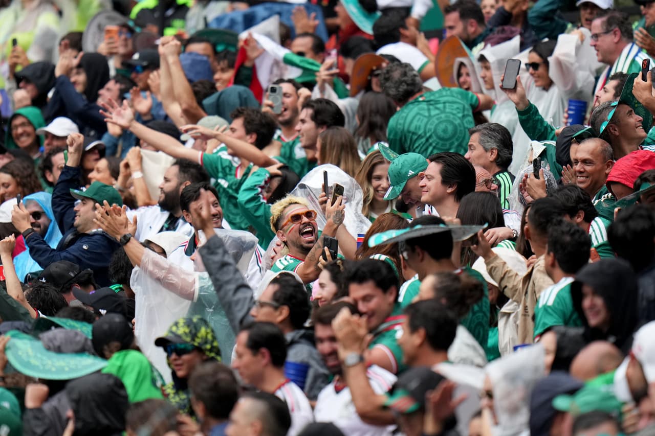 Mexico fans celebrate in the second half during the World Cup Group A soccer match between Mexico and South Africa in Mexico City, Thursday, June 11, 2026. (AP Photo/Eduardo Verdugo)