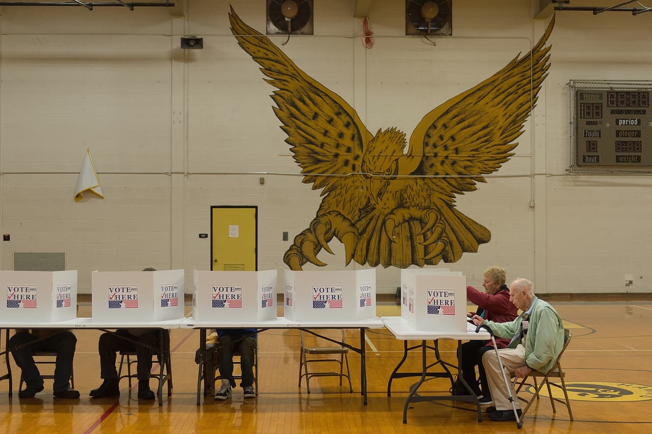 FLORISSANT, MO - NOVEMBER 08: Voters cast their ballots at a polling station at Hazelwood Central High School on November 8, 2016 in Florissant, Missouri. Americans today will choose between Republican presidential candidate Donald Trump and Democratic presidential candidate Hillary Clinton as they go to the polls to vote for the next president of the United States. (Photo by Michael B. Thomas/Getty Images)