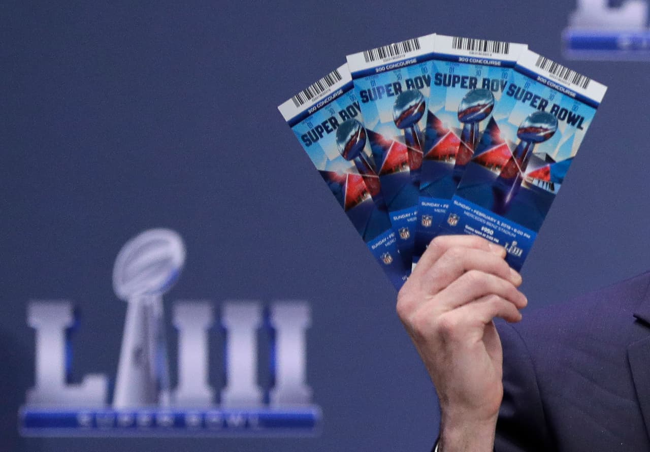 Michael, Buchwald, NFL Senior Counsel, Legal, holds up Super Bowl 53 tickets as he explains the security features on the tickets during a news conference for the NFL Super Bowl 53 football game Thursday, Jan. 31, 2019, in Atlanta.