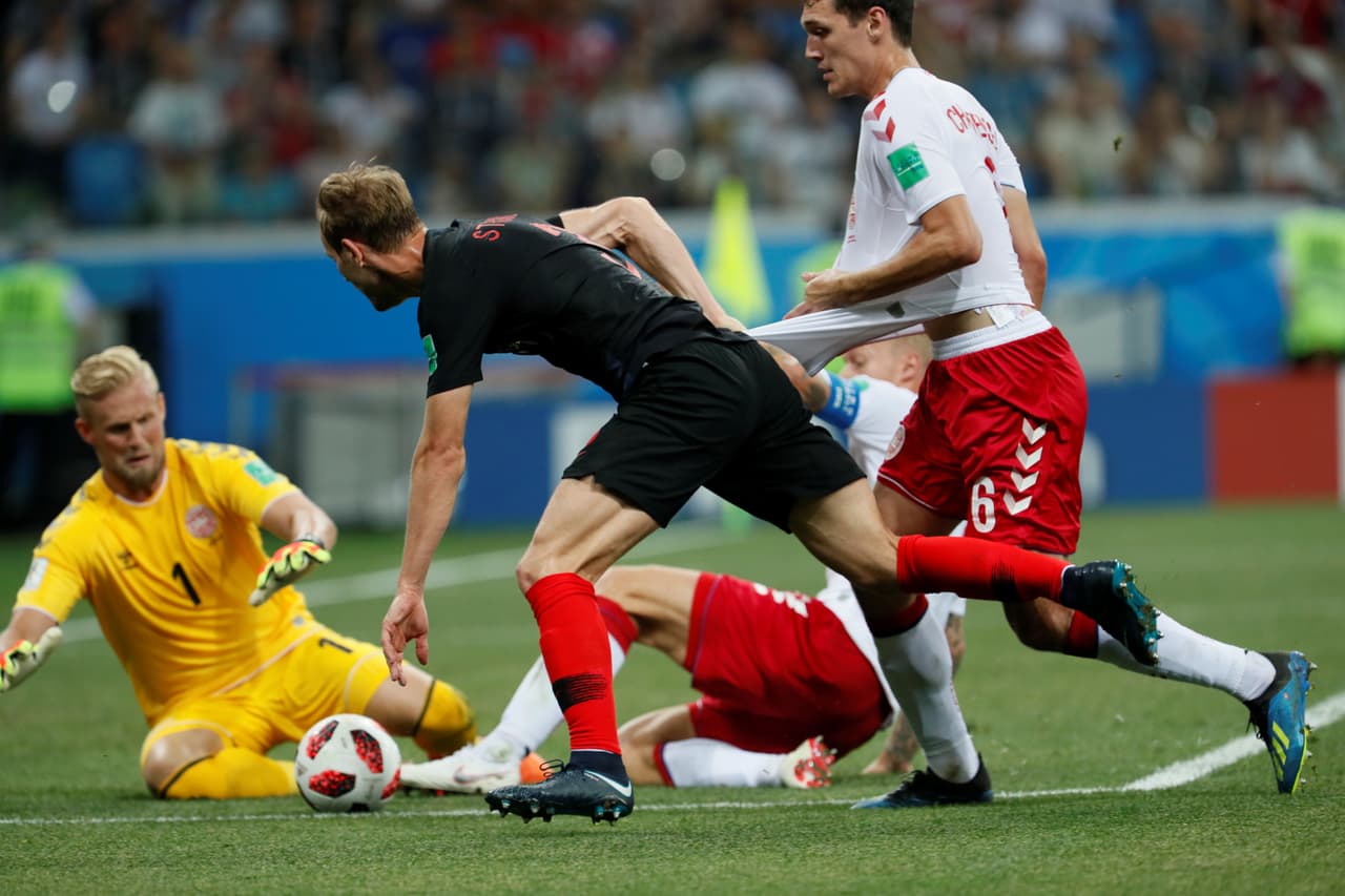 NIZHNY NOVGOROD, RUSSIA - JULY 1: Ivan Strinic (C) of Croatia national team in action against Kasper Schmeichel (L) and Andreas Christensen of Denmark national team during the 2018 FIFA World Cup Russia Round of 16 match between Croatia and Denmark at Nizhny Novgorod Stadium on July 1, 2018 in Nizhny Novgorod, Russia. (Photo by MB Media/Getty Images)