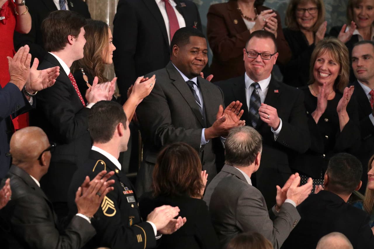 Otro de los invitados de Donad Trump: Corey Adams, un soldador de Dayton, Ohio, que planea usar el dinero de sus recortes de impuestos para los ahorros de educación de sus hijas
<br>