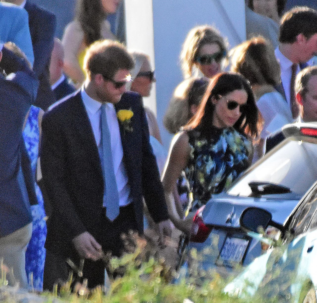 Photo © 2017 Mega/The Grosby Group PREMIUM EXCLUSIVE Jamaica, March 03, 2017 Royal couple Prince Harry and his girlfriend Meghan Markle were spotted attending a friend's wedding. Harry and Meghan enjoyed the festivities with the whole group before breaking off for some private conversation at a small table.