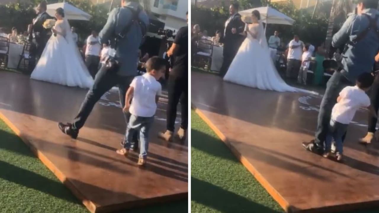 Niño es aplastado por fotógrafo en plena boda.
