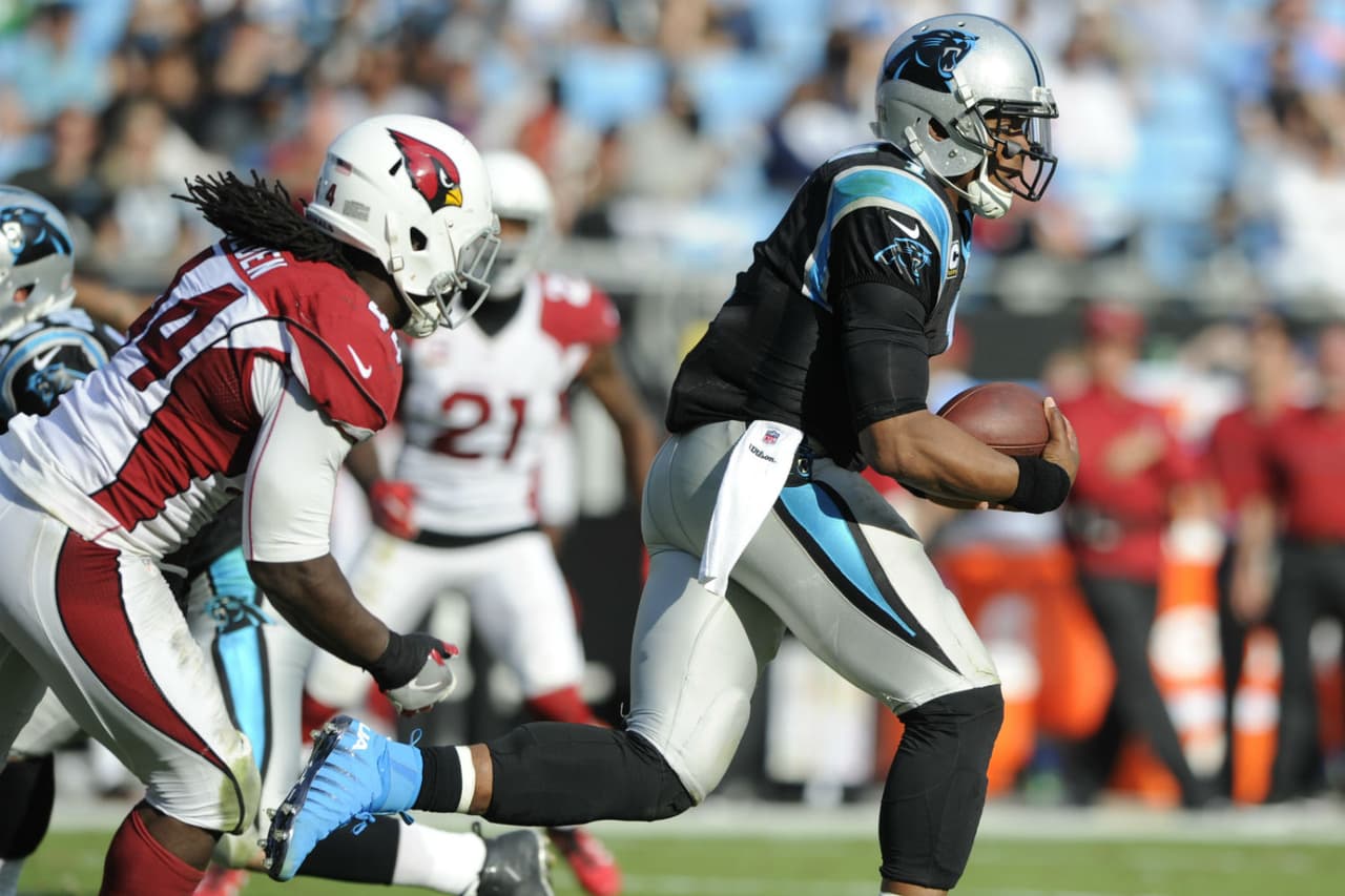 Cam Newton tuvo números discretos, pero fue efectivo.