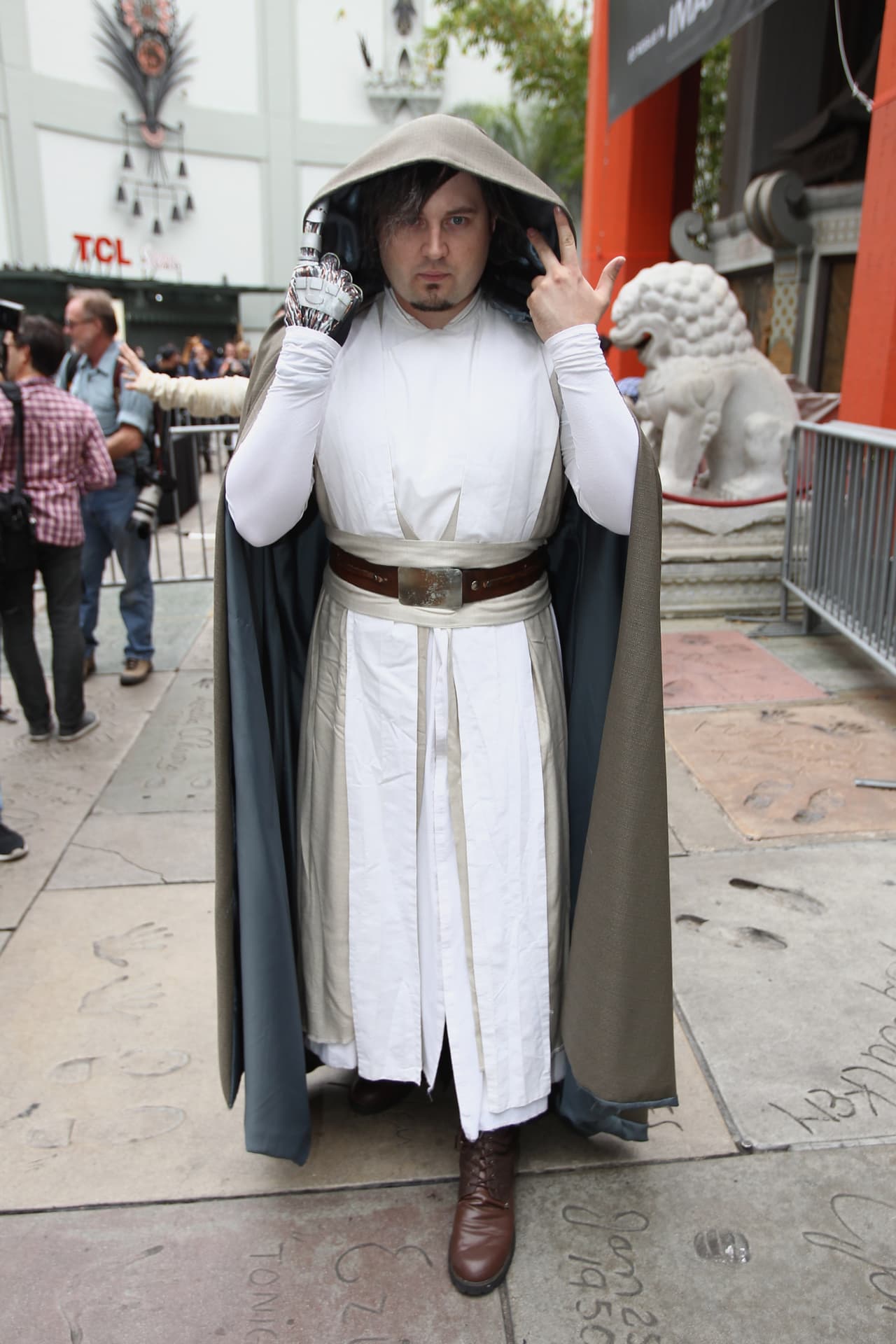 A fan poses for a photo during the costume contest of Star Wars fans lining up to see Star Wars Rogue One: A Star Wars Story at the TCL Chinese Theatre in Hollywood, California, on December 15, 2016. / AFP / TOMMASO BODDI (Photo credit should read TOMMASO BODDI/AFP/Getty Images)