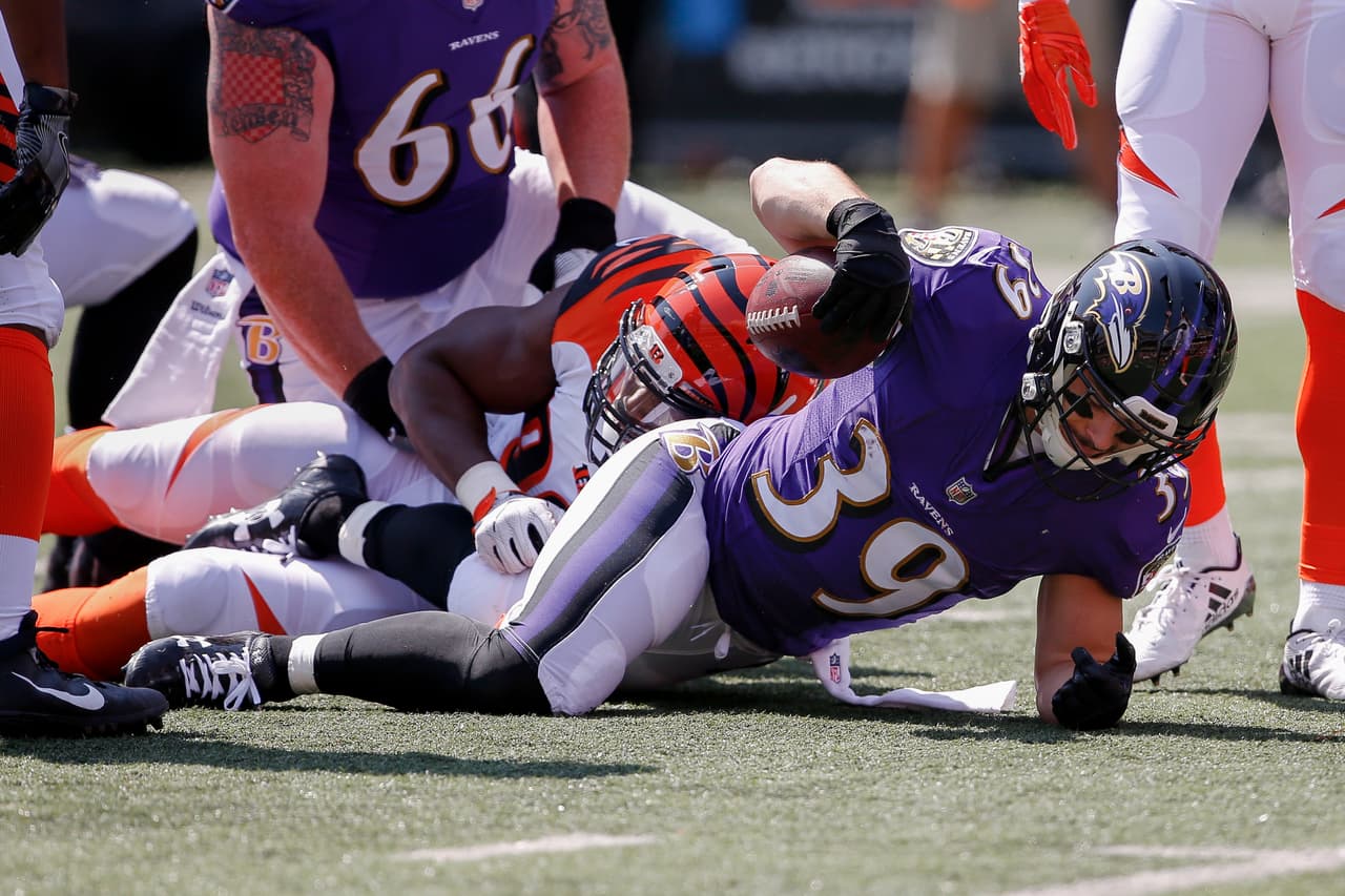 Baltimore Ravens running back Danny Woodhead (39) is slow to stand up after being injured on a play in the first half of an NFL football game against the Cincinnati Bengals, Sunday, Sept. 10, 2017, in Cincinnati. (AP Photo/Gary Landers)