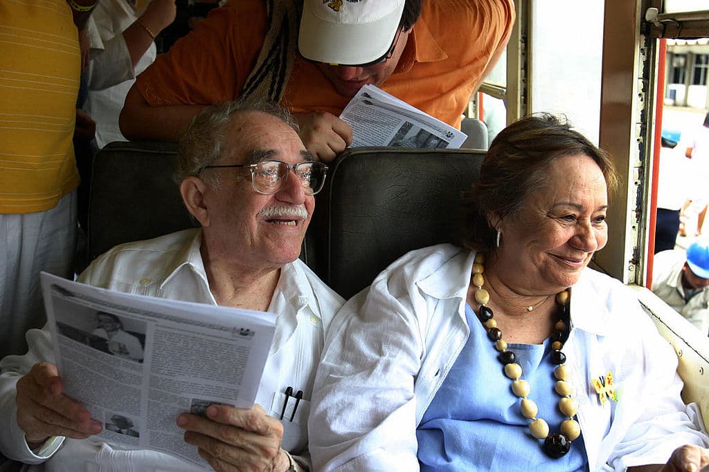 Colombian Nobel Prize for Literature 1982 Gabriel Garcia Marquez, sitting in the carriage alongisde his wife Mercedes Barcha, smiles upon arriving at his hometown Aracataca by train 30 May, 2007 in Santa Marta, Colombia. Garcia Marquez didn't visit Aracataca in twenty years.