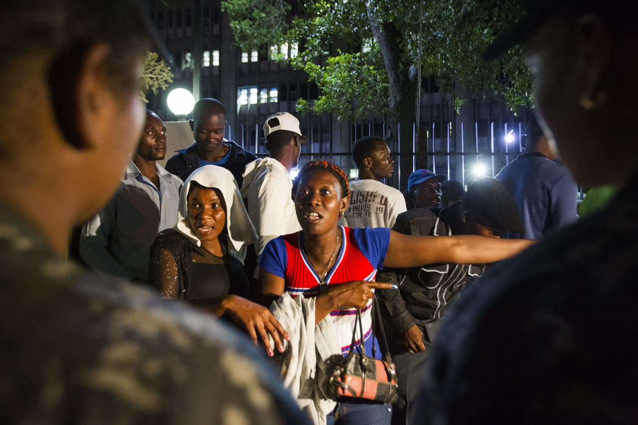 El embajador haitiano Bocchit Edmond respondió mostrándose complacido por el informe .