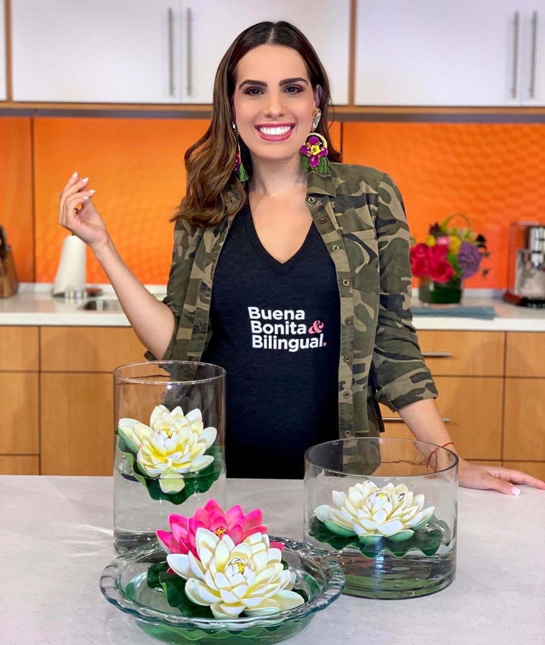 En la última semana de junio la pancita ya se hacía notar, mira como el top 'strech' la delata.