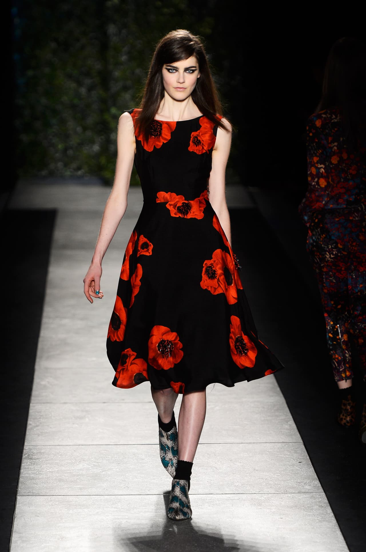 Este traje de corte 'lady like' fue creado por
<b> Tracy Reese,</b> una de las favoritas de Michelle, para su colección 
<b>Fall 2013</b>. 
<b>Su valor fue de <a href="http://www.shefinds.com/2013/michelle-obamas-tracy-reese-dress-from-the-mlk-tribute-is-still-in-stock/">498 dólares</a></b>